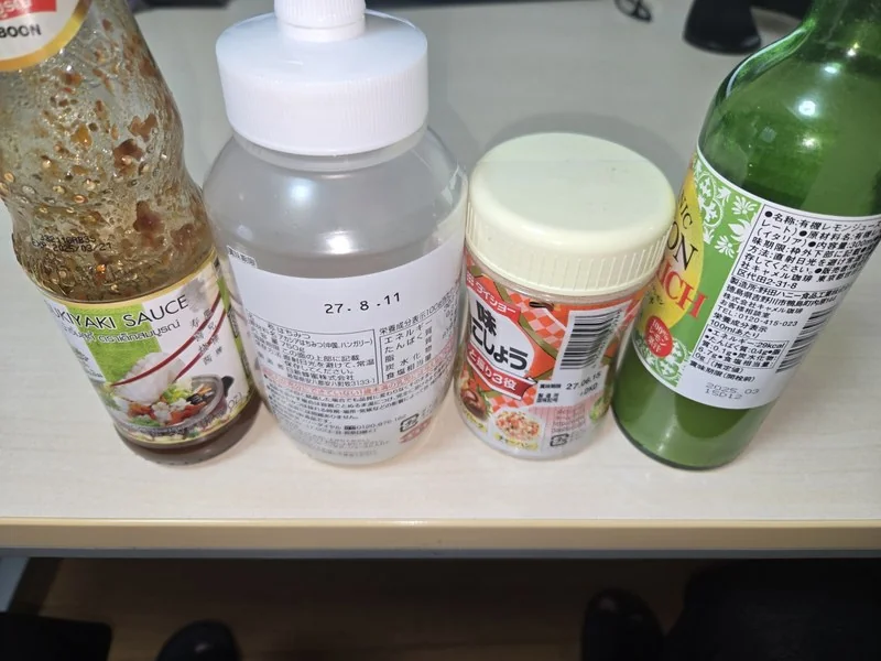 Four grocery items lined up in a single photo